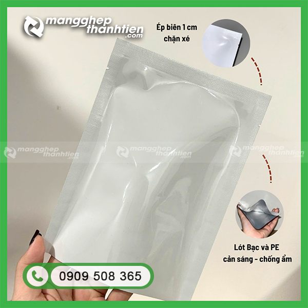 T&uacute;i &eacute;p 3 bi&ecirc;n 2 mặt sữa l&oacute;t bạc v&agrave; PE cản s&aacute;ng, chống ẩm